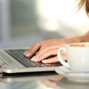 Close up of a woman hands typing